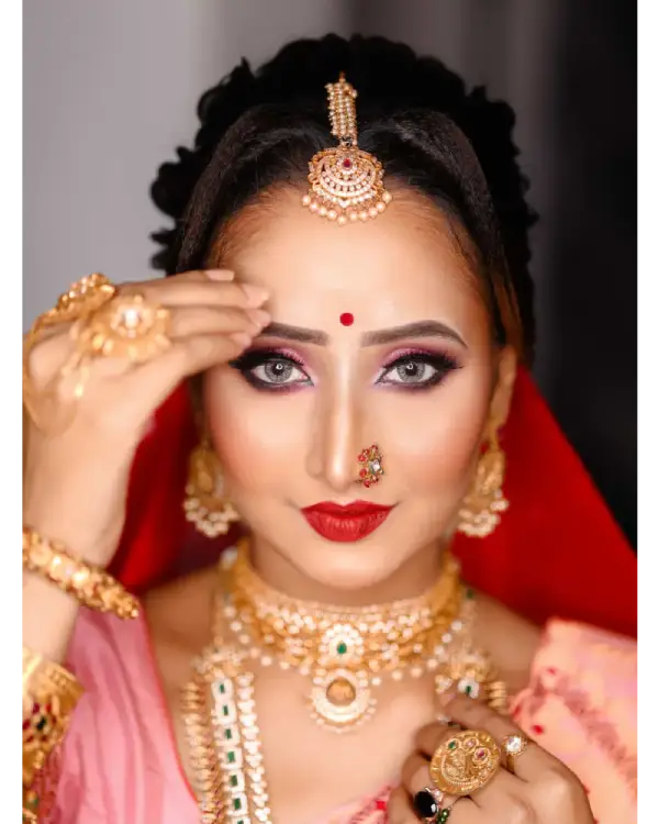 Assamese bride look by Chandrama Kalita showcasing traditional bridal makeup and attire