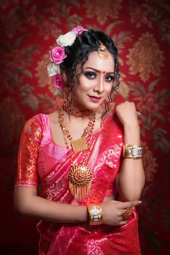 Assamese bride look by Chandrama Kalita featuring traditional bridal makeup and attire